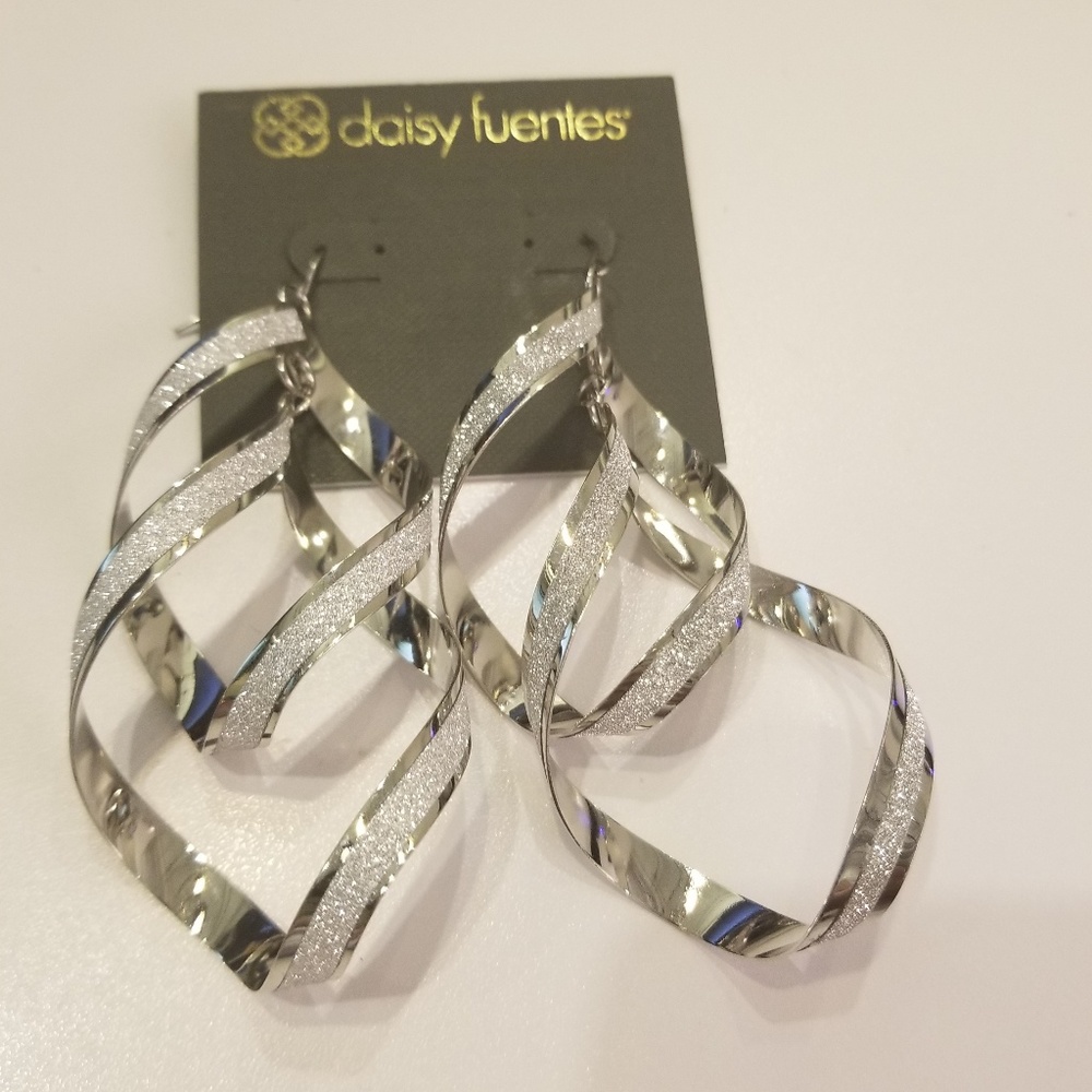 Swirly silver tone earrings